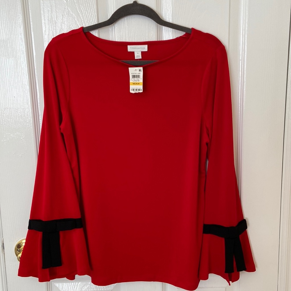Read long sleeve blouse with a bow tie on the end of sleeves